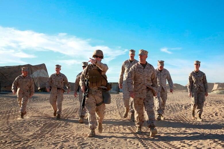 U.S. Marine Col. Jason A. Beaudoin, commanding officer of Marine Corps Logistics Operations Group, tours 1st Maintenance Battalion, 1st Marine Logistics Group’s forward operating base during exercise Steel Knight at Marine Corps Air Ground Combat Center Twentynine Palms, Calif., Dec. 8, 2016. Steel Knight 2017 is a 1st Marine Division-led exercise that exposes Marines and Sailors to skill sets necessary to operate as a fully capable Marine air ground task force. (U.S. Marine Corps photo by PFC Timothy Shoemaker)