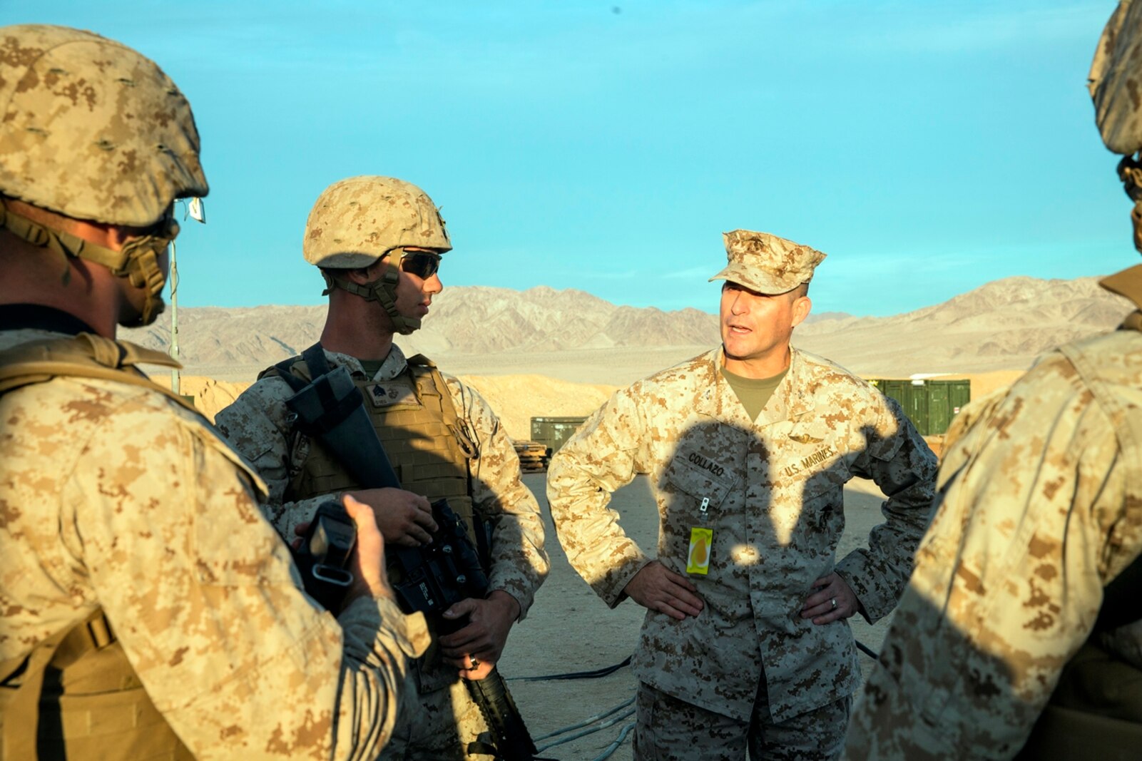 U.S. Marine Col. Jaime Collazo, the commanding officer of Combat Logistics Regiment 15, 1st Marine Logistics Group, talks to 1st Maintenance Battalion Marines during exercise Steel Knight 2017 at Marine Air Ground Combat Center Twentynine Palms, Calif., Dec. 8, 2016. Steel Knight 2017 is a 1st Marine Division-led exercise that exposes Marines and Sailors to skill sets necessary to operate as a fully capable Marine air ground task force. (U.S. Marine Corps photo by Lance Cpl. Adam Dublinske)