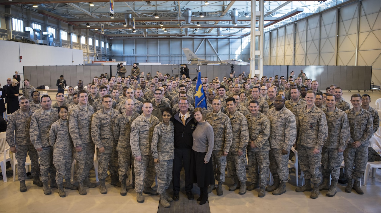 Defense Secretary Ash Carter poses for a picture with airmen assigned to the 31st Mission Support Group at Aviano Air Base, Italy, Dec. 13, 2016. DoD photo by Air Force Tech. Sgt. Brigitte N. Brantley