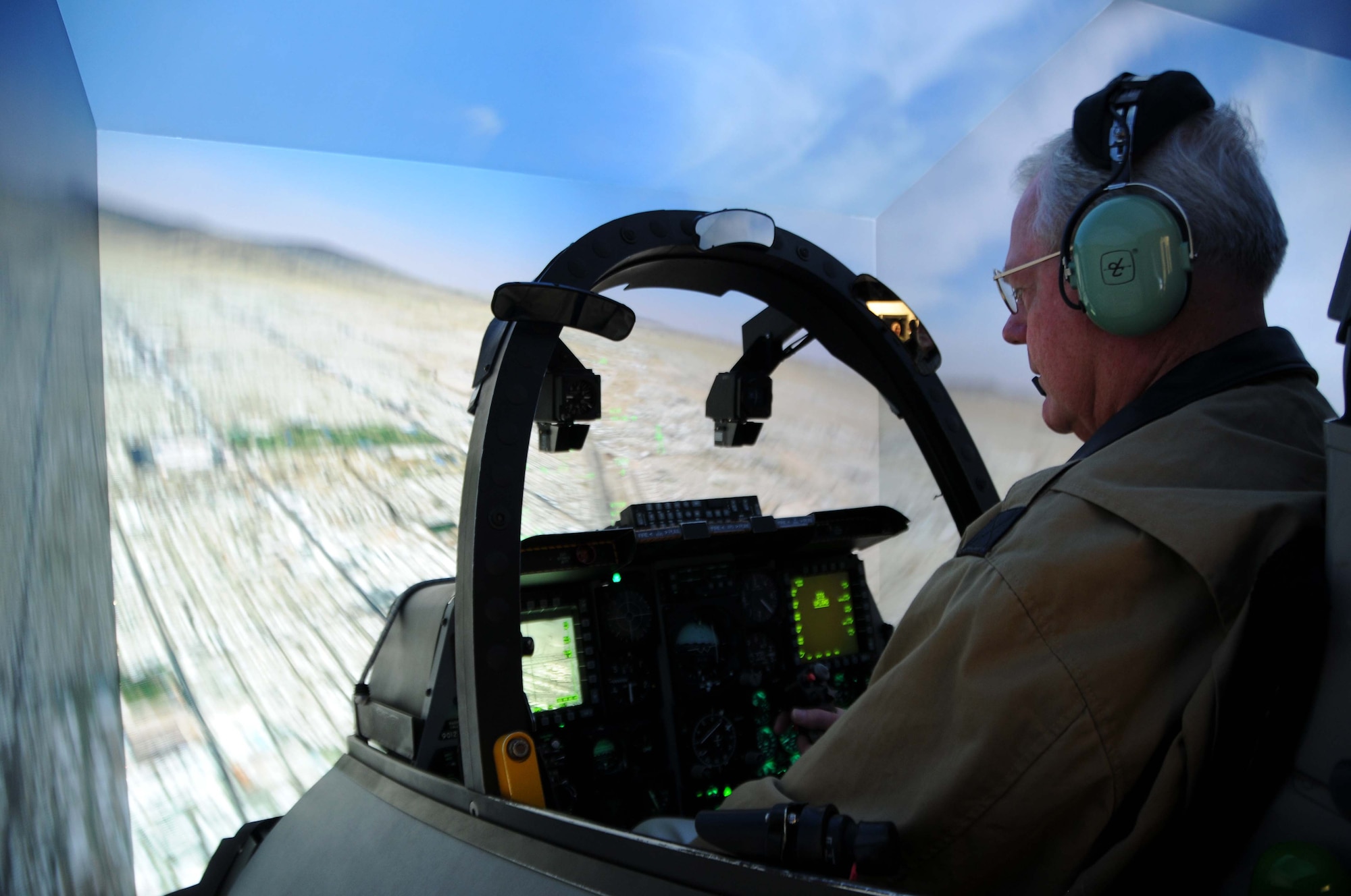 Retired Major General James W. Graves, flies the A-10C Thunderbolt II simulator during the 47th Fighter Squadron alumni visit at Davis-Monthan Air Force Base, Ariz., Dec. 6, 2016. To better understand the unit’s current aircraft, the alums were given the opportunity to sit in the simulator and compete in teams of two. Graves is a former Assistant to the Chairman Joint Chief of Staff for Reserve matters and former 47 FS commander 1996-1997. (U.S. Air Force photo by Tech. Sgt. Courtney Richardson) 