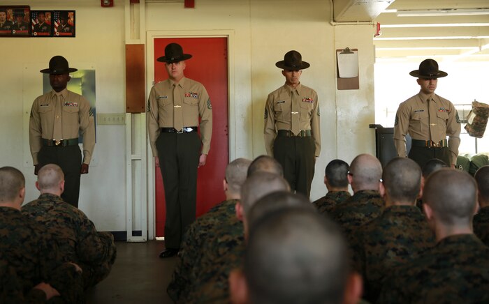Drill instructors of Delta Company, 1st Recruit Training Battalion, are introduced to their new recruits during pick up at Marine Corps Recruit Depot San Diego, Dec. 9. After spending the first week conducting in-processing, recruits marched to their new squad bay where their drill instructors introduced themselves, recited the Drill Instructor Creed and began carrying out the mission of transforming civilians into United States Marines. Annually, more than 17,000 males recruited from the Western Recruiting Region are trained at MCRD San Diego. Delta Company is scheduled to graduate March 3.