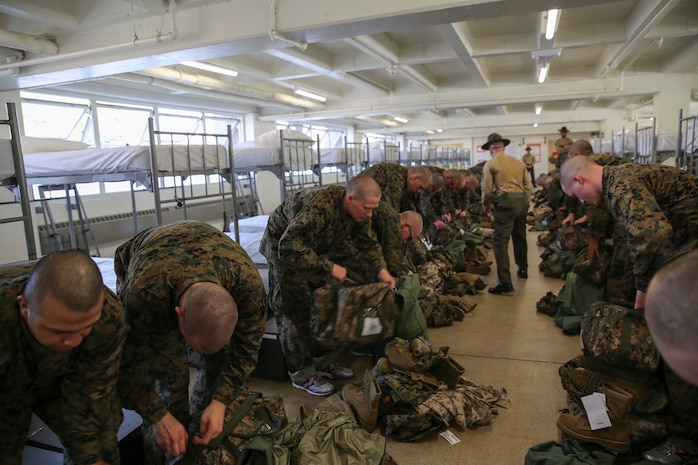 Recruits from Delta Company, 1st Recruit Training Battalion, undergo an initial gear inspection during pick up at Marine Corps Recruit Depot San Diego, Dec. 9. The new recruits learned how to properly make their racks and conducted an initial gear inspection to ensure they were prepared to begin training. Annually, more than 17,000 males recruited from the Western Recruiting Region are trained at MCRD San Diego. Delta Company is scheduled to graduate March 3.