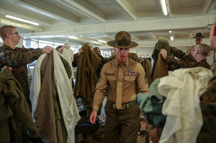 Recruits from Delta Company, 1st Recruit Training Battalion, undergo an initial gear inspection during pick up at Marine Corps Recruit Depot San Diego, Dec. 9. The new recruits learned how to properly make their racks and conducted an initial gear inspection to ensure they were prepared to begin training. Annually, more than 17,000 males recruited from the Western Recruiting Region are trained at MCRD San Diego. Delta Company is scheduled to graduate March 3.