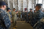 Vice Chief of Naval Operations Adm. William Moran answers questions during an all-hands call aboard littoral combat ship USS Coronado (LCS 4), Dec. 13, 2016. Currently on a rotational deployment in support of the Asia-Pacific Rebalance, Coronado is a fast and agile warship tailor-made to patrol the region's littorals and work hull-to-hull with partner navies, providing 7th Fleet with the flexible capabilities it needs now and in the future. 