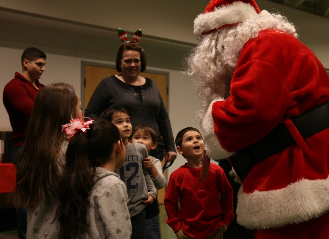 Santa visits Detachment's 2016 Christmas Party.
