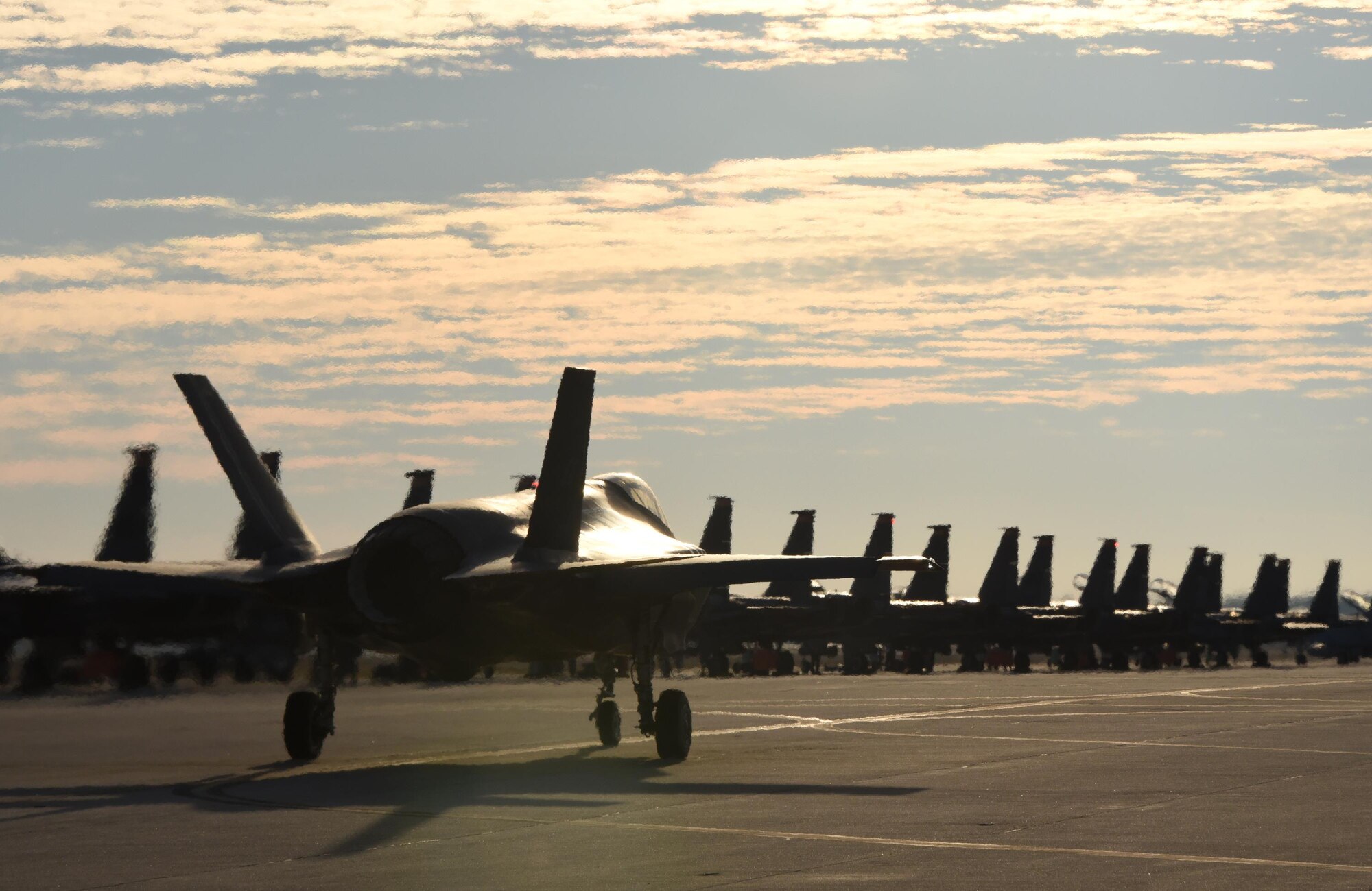 A U.S. Air Force F-35A Lightning II from Eglin Air Force Base taxis down the flightline before takeoff during Checkered Flag 17-1 at Tyndall Air Force Base, Fla., Dec. 8, 2016. During the exercise, the F-35s work alongside F-22 Raptors, F-15E Strike Eagles, F-16 Fighting Falcons, HH-60G Pave Hawks and an E-3 Sentry to ensure seamless integration of these airframes. (U.S. Air Force photo by Staff Sgt. Alex Fox Echols III/Released)