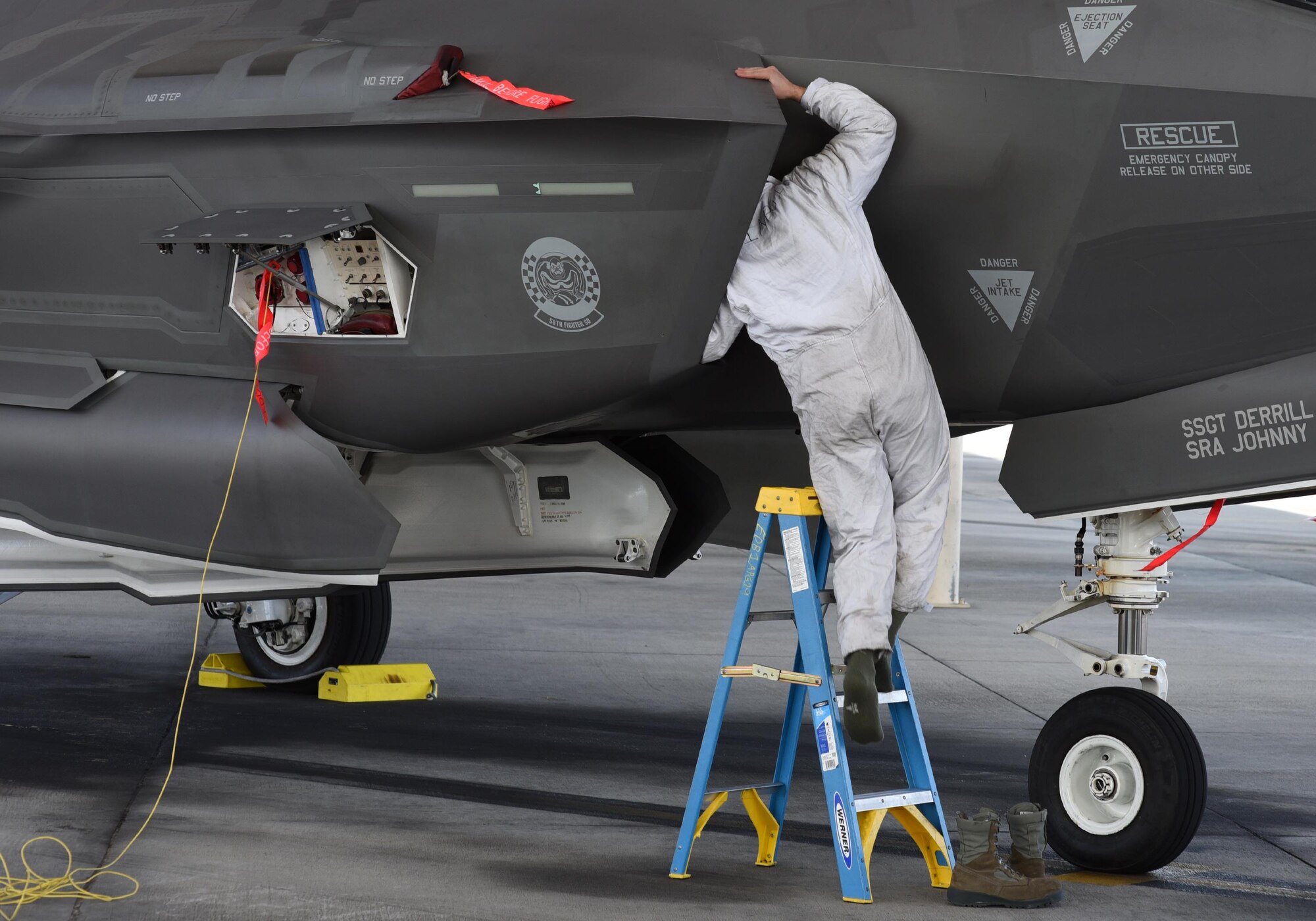 A U.S. Air Force F-35A Lightning II aircraft maintainer from Eglin Air Force Base inspects the intake of a jet during Checkered Flag 17-1 at Tyndall Air Force Base, Fla., Dec. 8, 2016. More than 90 Eglin personnel came to Tyndall in support of the large-scale, total force exercise. (U.S. Air Force photo by Staff Sgt. Alex Fox Echols III/Released)