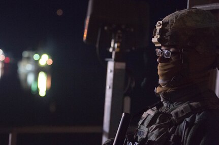 U.S. Air Force Senior Airman Jabai Robinson, 633rd Security Forces Squadron response force leader, stands post during exercise Operation Resolute Endeavor II at Joint Base Langley-Eustis, Va., Dec. 7, 2016. The 633rd SFS members patrolled and maintained security on Third Port during the five-day exercise. (U.S. Air Force photo by Airman 1st Class Derek Seifert)