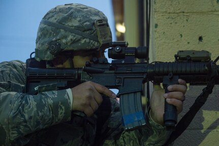A U.S. Air Force Airman assigned to the 633rd Security Forces Squadron provides security during exercise Operation Resolute Endeavor II at Joint Base Langley-Eustis, Va., Dec. 5, 2016. The 633rd SFS performed their first waterborne infiltration during the exercise to secure Third Port. (U.S. Air Force photo by Airman 1st Class Derek Seifert)
