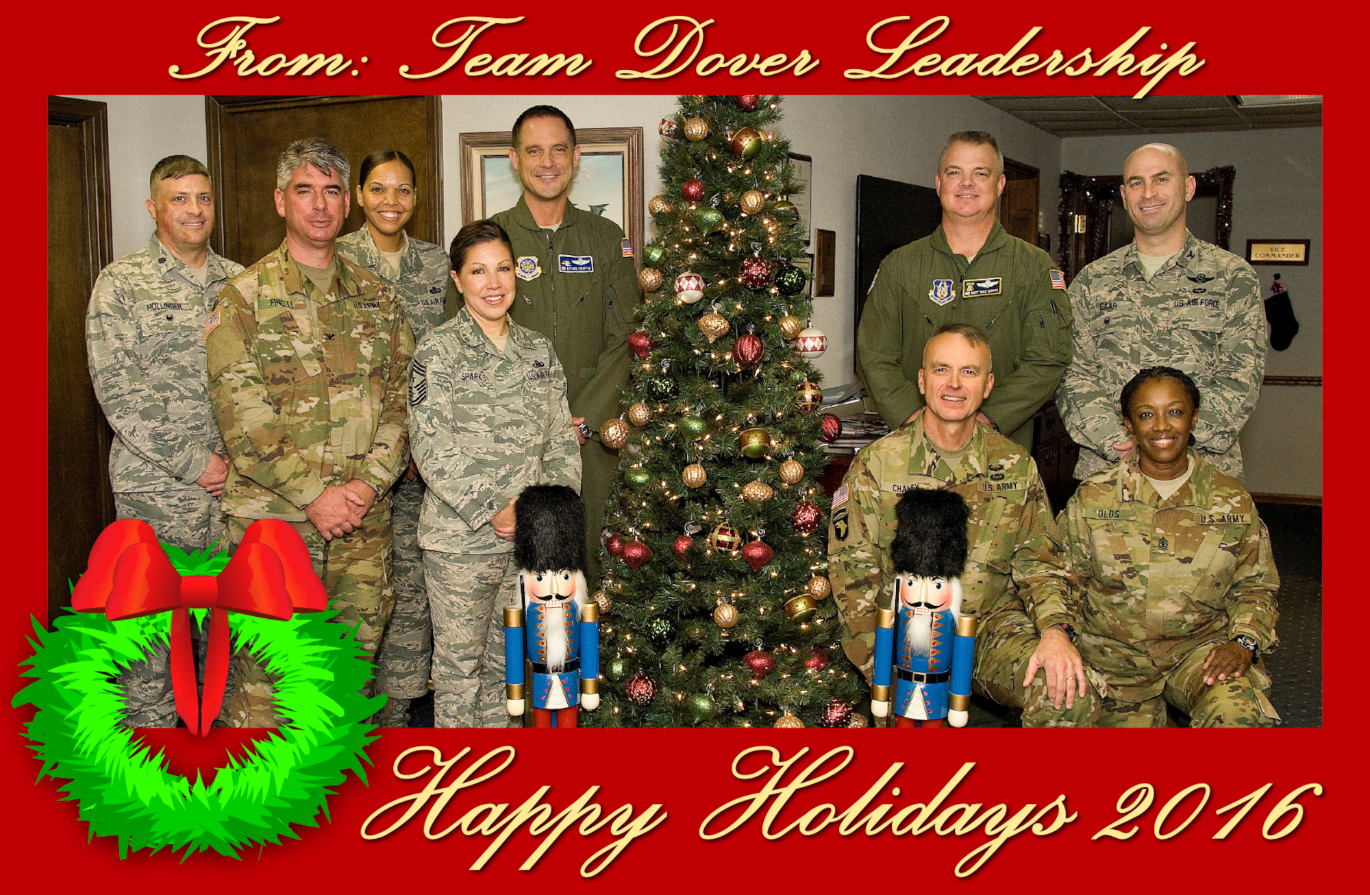 Team Dover senior leadership gather for a holiday photo in the command section of the 436th Airlift Wing building Dec. 7, 2016, at Dover Air Force Base, Del. Pictured are from back row left to right: Lt. Col. Chip Hollinger, Air Force Mortuary Affairs Office deputy commander; Chief Master Sgt. Meshelle Dyer AFMAO chief enlisted manager; Col. Ethan Griffin, 436th AW commander; Col. D. Scott Durham, 512th AW commander; Col. Scott Gaab, 436th AW vice commander; front row left: Army Col. Louis Finelli, Armed Forces Medical Examiner System director; Chief Master Sgt. Sarah Sparks, 436th AW command chief; Army Lt. Col. Kim Chaney, Joint Personnel Effects Depot commander, and Army Sgt. Maj. Cendric Olds, JPED senior enlisted advisor, gather for a holiday photo in the command section of the 436th AW building Dec. 7. 2016, at Dover Air Force Base, Del. (U.S. Air Force photo illustration by Staff Sgt. Jared Duhon)