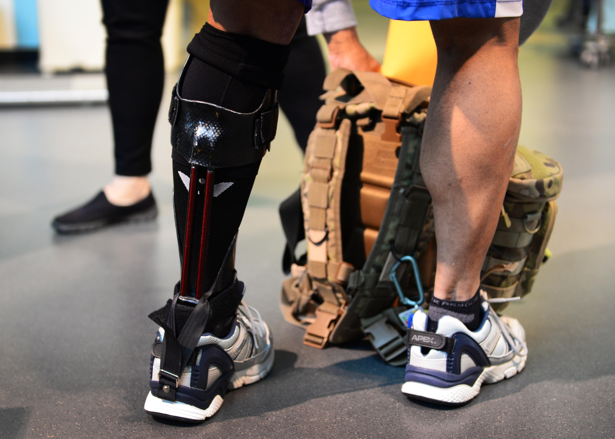 U.S. Air Force Lt. Col. Melchizedek “Kato” Martinez, a career tactical communications officer, prepares for a rehabilitation session at the Center for the Intrepid at Joint Base San Antonio-Fort Sam Houston, Texas, Dec. 7, 2016. During the Brussels Airport bombing March 22, 2016, which tragically killed his wife and injured his children, Kato suffered multiple burns and injuries and has since undergone a number of grueling rehabilitative procedures. (U.S. Air Force photo by Senior Airman Chip Pons)