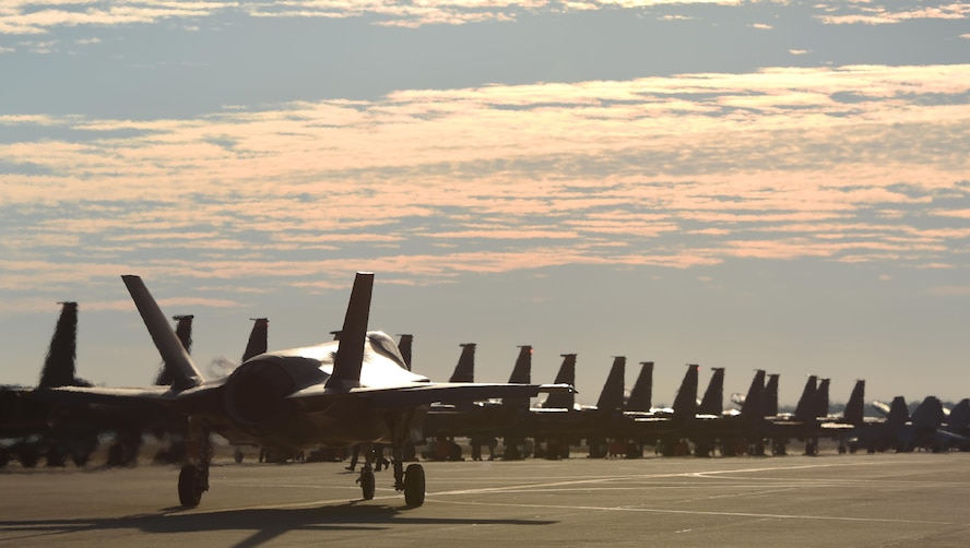 An F-35A Lightning II taxis before takeoff to participate in simulated defensive counter air operations Dec. 8, 2016, at Tyndall Air Force Base, Florida. The 33d Fighter Wing deployed six F-35A Lightning II and 95 personnel to Checkered Flag 17-1. Checkered Flag is a combat rehearsal where 15 aircraft platforms take to the skies to fly realistic and large-scale operations to prepare for contingency operations.  Specifically, this exercise tested the range of capabilities for the F-35A and the 33 FW student and instructor pilots, maintainers, air battle managers and intelligence officers by operating from two locations. (U.S. Air Force photo by Staff Sgt. Peter Thompson)