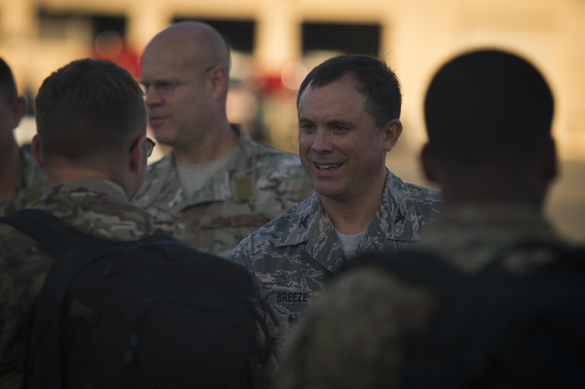 Col. Steven Breeze, vice commander of the 1st Special Operations Wing, greets Air Commandos at Hurlburt Field, Fla, Dec. 13, 2016. More than 125 Air Commandos were greeted as they returned from deployment by family and friends. (U.S. Air Force photo by Airman 1st Class Joseph Pick)
