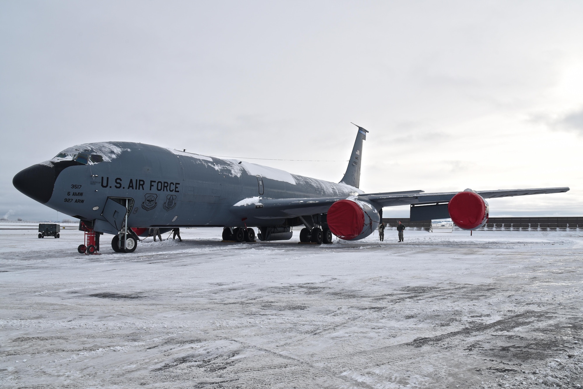 92nd Aircraft Maintenance Squadron Airmen manually deice a KC-135 Stratotanker Dec. 12, 2016, at Fairchild Air Force Base, Washington. During the winter months, deicing happens nearly every day. In 2015, Fairchild used 24,810 gallons of deicing fluid. (U.S. Air Force photo/Senior Airman Mackenzie Richardson)