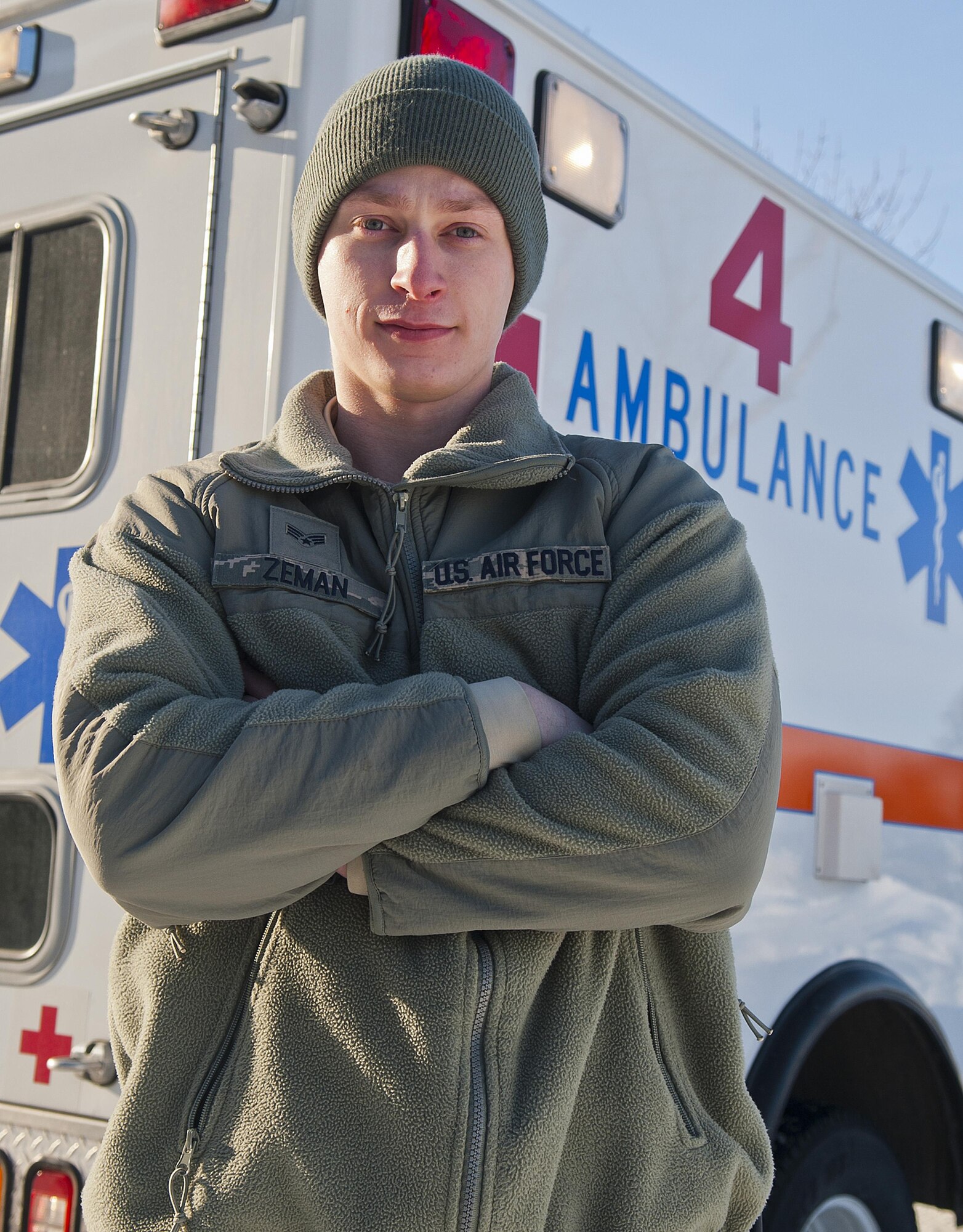 Senior Airman Larry Zeman, 5th Medical Operations Squadron aerospace medical technician, stands next to an emergency medical vehicle at Minot Air Force Base, N.D., Dec. 12, 2016. The ambulance services department is responsible for providing emergency medical response for all personnel on base. (U.S. Air Force photo/Airman 1st Class Jonathan McElderry)