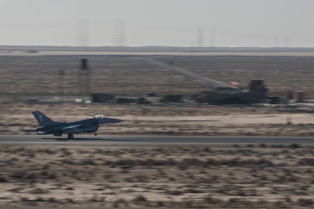 An F-16 Fighting Falcon assigned to the 134th Expeditionary Fighter Squadron lands on the runway at the 407th Air Expeditionary Group, Southwest Asia, Dec. 10, 2016. The F-16 squadron is comprised of Airmen from the 158th Fighter Wing of the Vermont Air National Guard. (U.S. Air Force photo by Master Sgt. Benjamin Wilson)(Released)