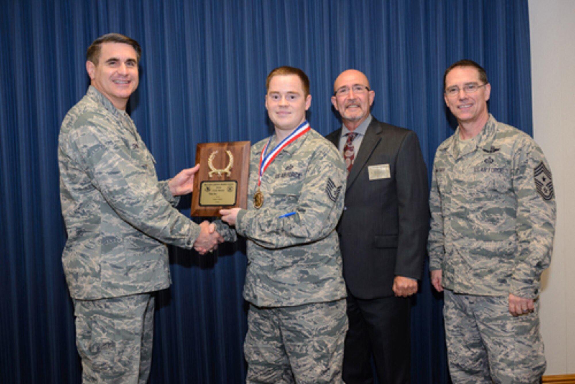 Tech. Sgt. Jon, Virginia Air National Guard-192nd Intelligence Squadron, earns the enlisted gold award for geospatial analyst, Nov. 2, 2016 at 25th Air Force Headquarters. (U.S. Air Force photo/William B. Belcher)