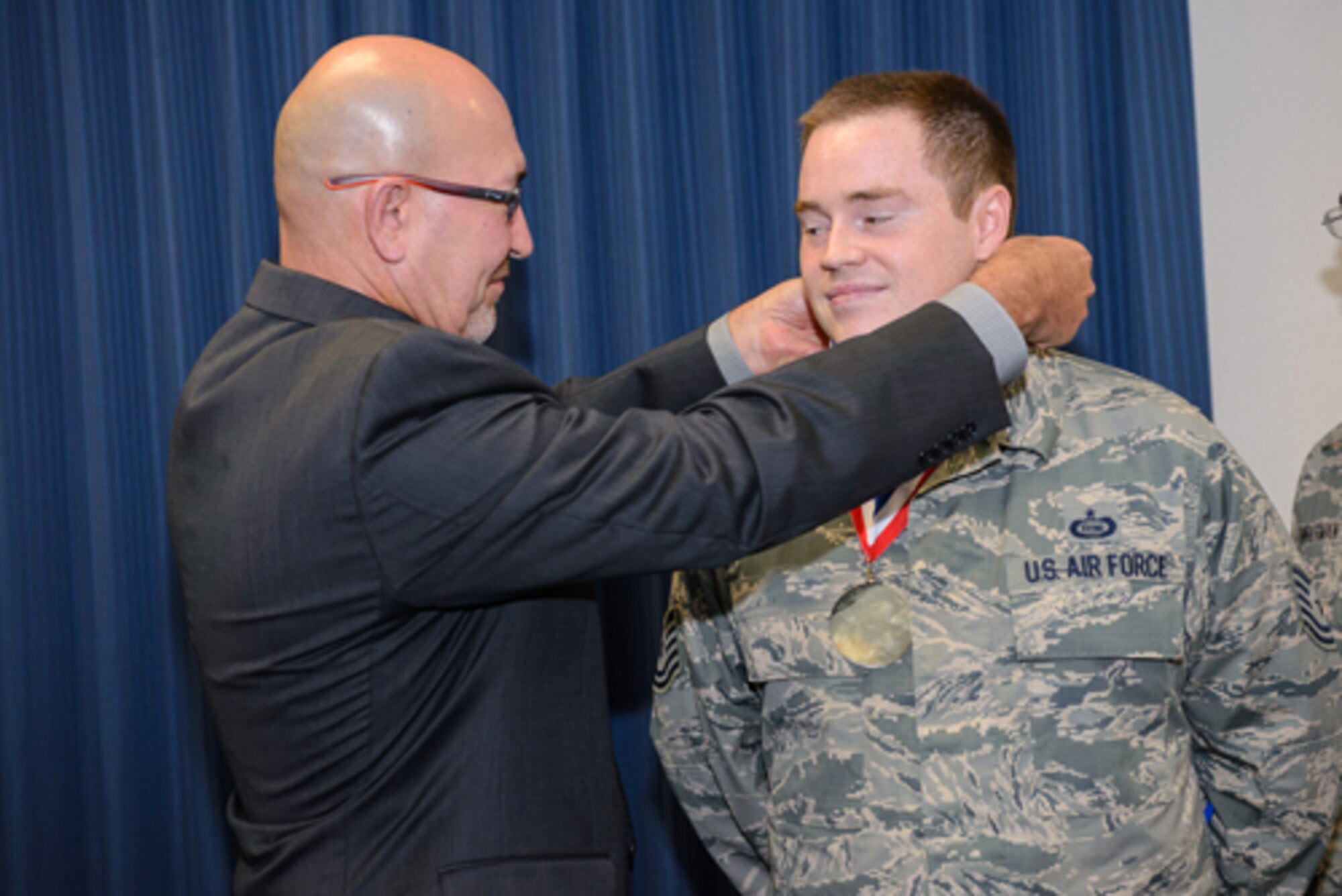 Tech. Sgt. Jon, Virginia Air National Guard-192nd Intelligence Squadron, earns the enlisted gold award for geospatial analyst, Nov. 2, 2016 at 25th Air Force Headquarters. (U.S. Air Force photo/William B. Belcher)