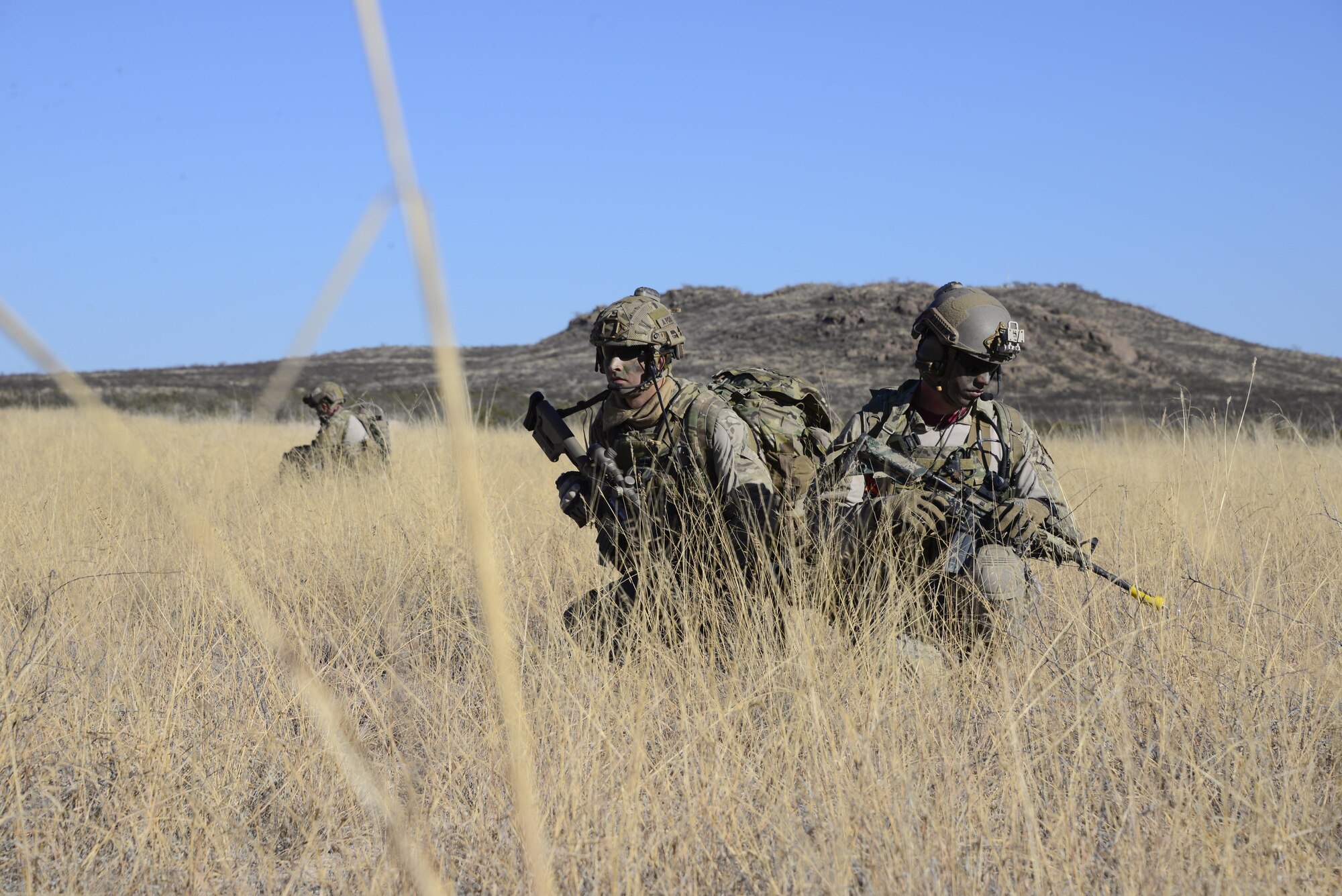 U.S. Air Force pararescuemen assigned to the 48th Rescue Squadron secure a drop zone during a mass casualty exercise at Fort Huachuca, Ariz., Dec. 8, 2016. During the exercise, pararescuemen were expected to triage, treat and evacuate casualties, and to eliminate any presence of simulated opposing forces. (U.S. Air Force photo by Senior Airman Betty R. Chevalier)
