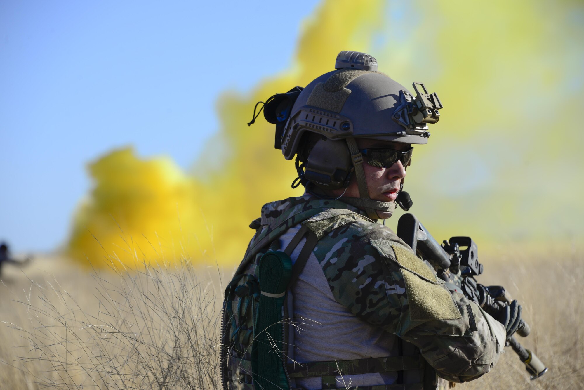 A U.S. Air Force pararescueman from the 48th Rescue Squadron provides overwatch during a mass casualty exercise at Fort Huachuca, Ariz., Dec. 8, 2016. Pararescuemen were air dropped into the site of a simulated plane crash, where they triaged casualties and had them airlifted from the site. (U.S. Air Force photo by Senior Airman Betty R. Chevalier)