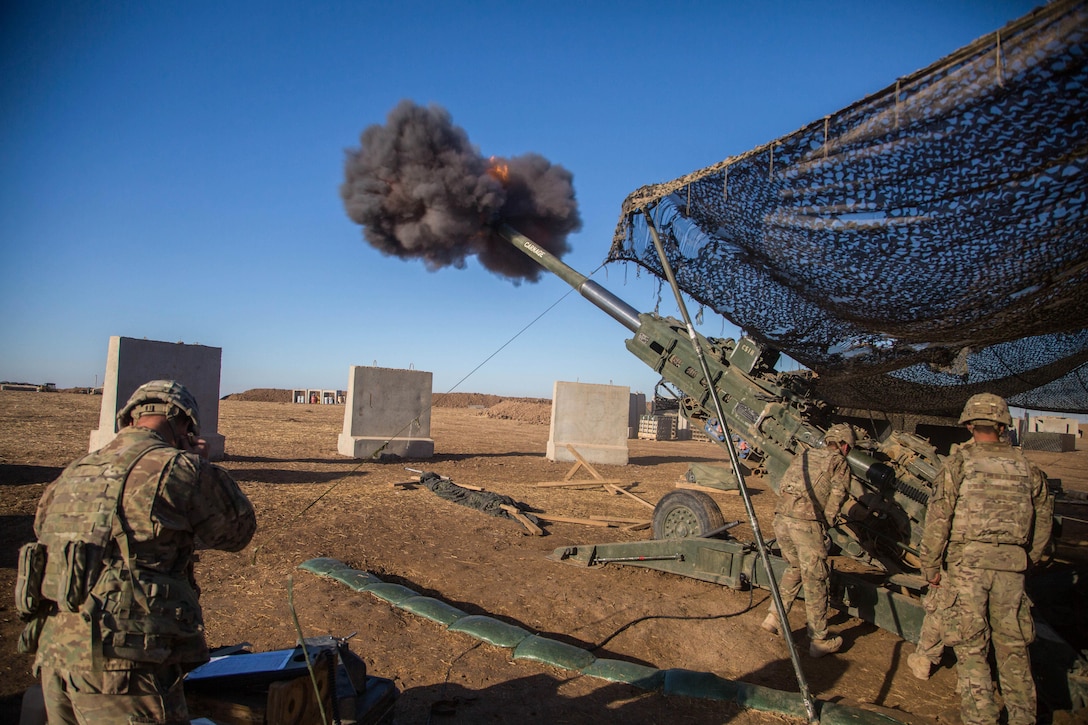 U.S. Soldiers assigned to Charlie Battery, 1st Battalion, 320th Field Artillery Regiment, 2nd Brigade Combat Team, 101st Airborne Division fire a M777 A2 Howitzer in support of Iraqi security forces at Platoon Assembly Area 14, Iraq, Dec. 7, 2016. Charlie Battery conducted the fire mission in support of Combined Joint Task Force - Operation Inherent Resolve, the global Coalition to defeat ISIL in Iraq and Syria.  (U.S. Army photo by Spc. Christopher Brecht)