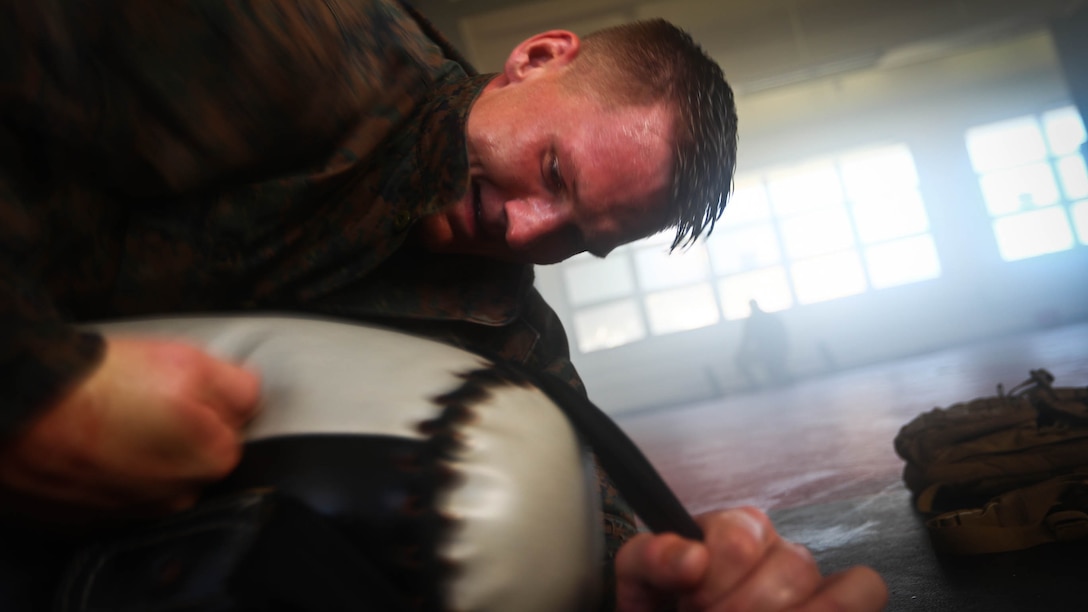 U.S. Marine Corps 2nd. Lt. Brandon J. Klewicki, a platoon commander with 1st Battalion, 3rd Marine Regiment, assigned to Martial Arts Instructor Course Class 1-17, School of Infantry West, Detachment Hawaii, conducts strikes on a punching bag during the MAIC at building 222, at Marine Corps Base Hawaii, Dec. 13, 2016. The MAIC is a three week long course that puts applicants through rigorous training designed to instill teamwork and develop leadership abilities necessary for a Marine Corps Martial Arts Program instructor to teach classes.