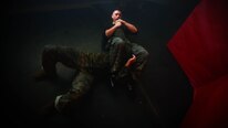 Staff Sgt. Jacob H. Olson, an infantry unit leader with Bravo Company, 1st Battalion, 3rd Marine Regiment, assigned to Martial Arts Instructor Course Class 1-17, School of Infantry West, Detachment Hawaii, executes an armbar during the MAIC at building 222, at Marine Corps Base Hawaii, Dec. 13, 2016. The MAIC is a three week long course that puts applicants through rigorous training designed to instill teamwork and develop leadership abilities necessary for a Marine Corps Martial Arts Program instructor to teach classes. 