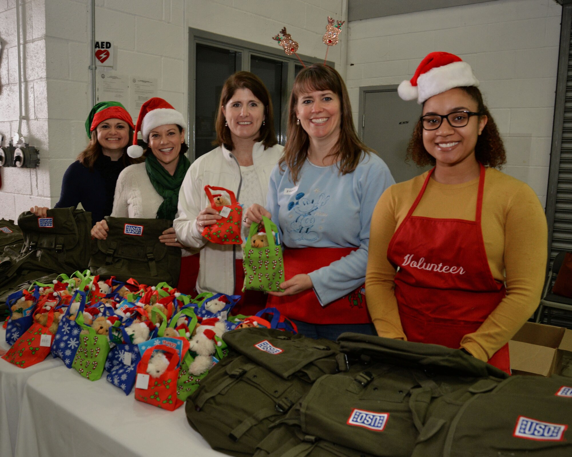 Members from the RAF Midenhall Spouses Club pose for a photograph during the annual Children’s Holiday Party Dec. 10, 2016, on RAF Mildenhall, England. The Military Spouses Club hosted both the Hearts Apart event, held monthly, and the annual Children’s Holiday Party for Team Mildenhall families. (U.S. Air Force photo by Senior Airman Christine Halan)