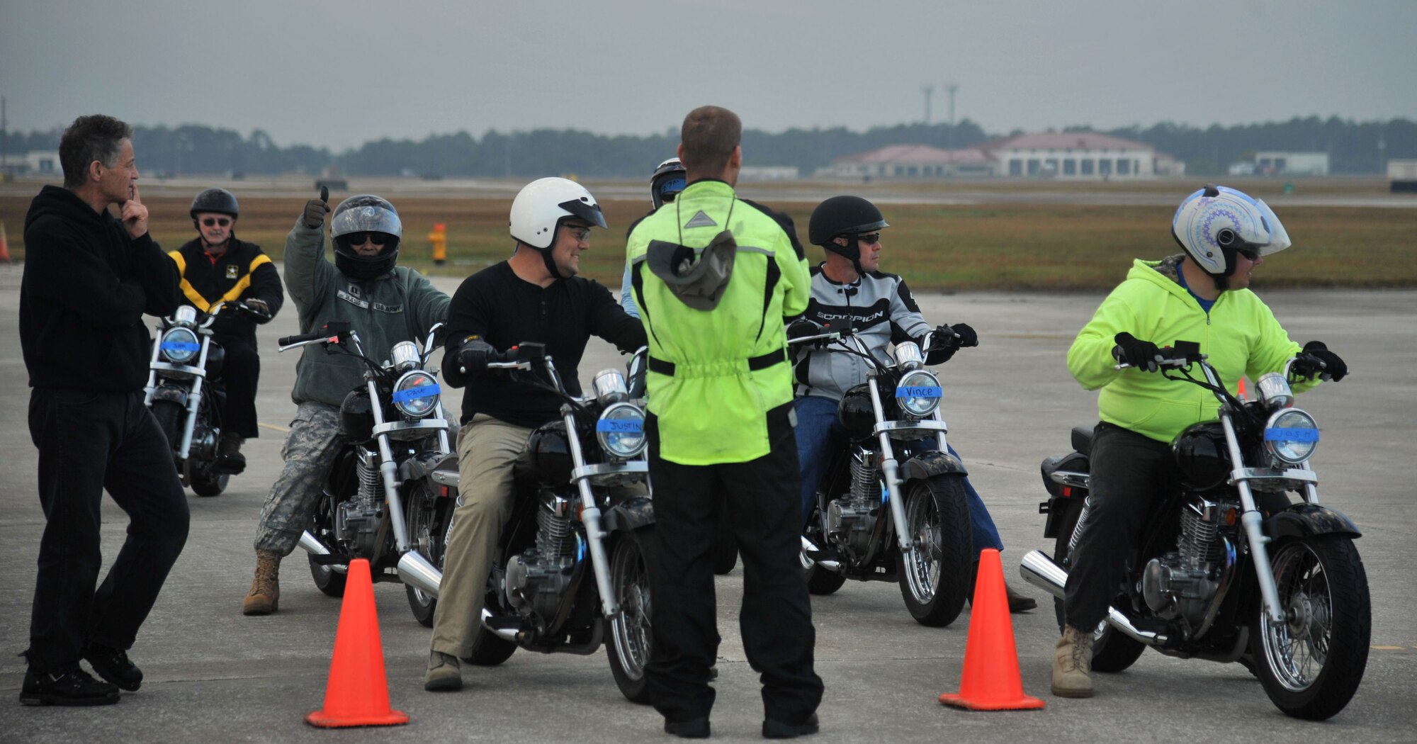 Students in the Basic Motorcycle Riders Course (BRC1) line up on motorcycles to begin riding the practice course, Dec. 8, 2016, at MacDill Air Force Base, Fla. The BRC1 allowed students to get classroom instruction on how to safely ride, as well as hands-on training in different scenarios. (U.S. Air Force photo by Airman 1st Class Rito Smith) 