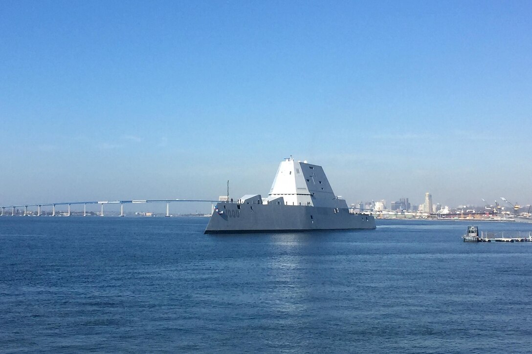 The Navy's most technologically advanced surface ship, USS Zumwalt, steams through San Diego Bay after the final leg of her three-month journey to her new home port in San Diego, Dec. 8, 2016. The Zumwalt will now begin installation of combat systems, testing and evaluation and operation integration with the fleet. Navy photo by Petty Officer 2nd Class Zachary Bell