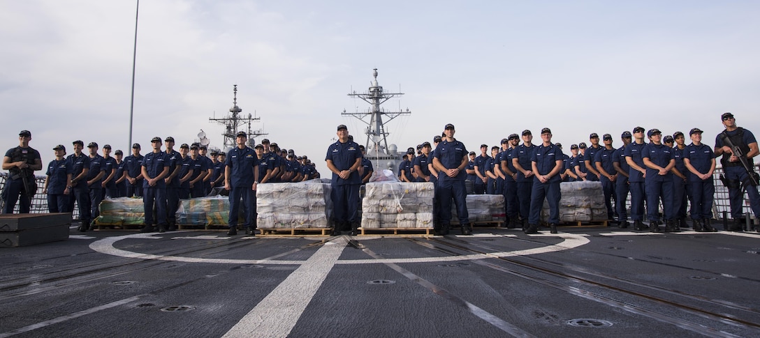 Coast Guard Cutter Waesche crewmembers offload seized cocaine from the cutter in San Diego on Oct. 27, 2016. Nearly 20 tons of narcotics were interdicted in international waters off the coast of Central and South America. Operation Martillo is a joint, interagency and multinational collaborative effort to deny transnational criminal organizations air and maritime access to the littoral regions of the Central American isthmus. (U.S. Coast Guard photo by Petty Officer 3rd Class Andrea Anderson)