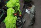 Staff Sgt. Scott Carey, a firefighter with the 910th Civil Engineer Squadron (CES), evaluates 910th CES  firefighters Tech. Sgt. Owen Brownfield and Staff Sgt. Justin Ross as they complete their Hazardous Materials (HAZMAT) training here, Dec. 4, 2016. The training is required for firefighters and enables them to safely and proficiently deal with any hazardous materials they may encounter while performing their duties. (U.S. Air Force photo/Staff. Sgt. Rachel Kocin) 