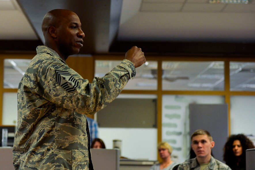 Chief Master Sgt. Kaleth Wright, U.S. Air Forces in Europe and Air Forces Africa command chief, delivers a speech at the 86th Comptroller Squadron at Ramstein Air Base, Germany, Nov. 23, 2016. Wright, who is slated to be the 18th Chief Master Sergeant of the Air Force, spoke to Airmen of all ranks about the importance of mentorship and leadership. (U.S. Air Force photo by Airman 1st Class Joshua Magbanua)