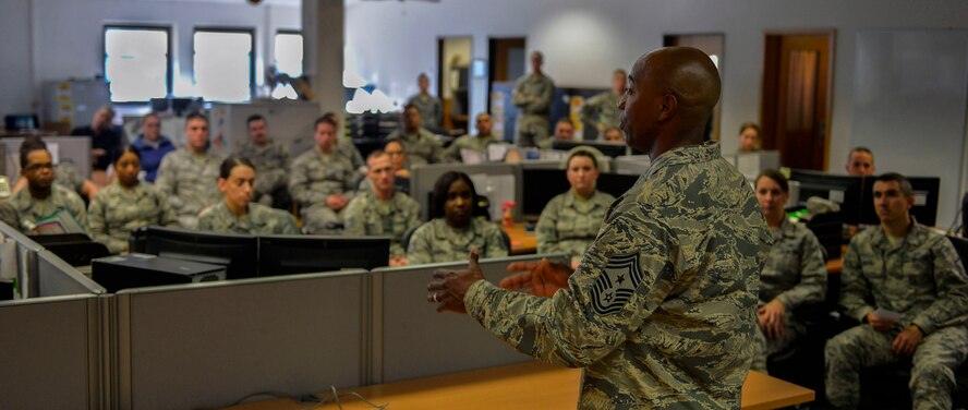 Chief Master Sgt. Kaleth Wright, U.S. Air Forces in Europe and Air Forces Africa command chief, speaks to Airmen of all ranks about the importance of mentorship at Ramstein Air Base, Germany, Nov. 23, 2016. Wright, who is slated to be the 18th Chief Master Sergeant of the Air Force, shared his story of how his mentor impacted his career. (U.S. Air Force photo by Airman 1st Class Joshua Magbanua)