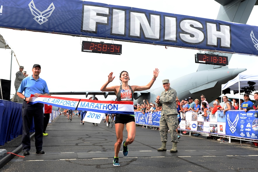 Rachel Harley from Birmingham, Ala., crosses the finish line to become the winner of the 20th U.S. Air Force Marathon women's full marathon division at Wright-Patterson Air Force Base, Ohio, with a time of 2:58:34 (U.S. Air Force photo / Wesley Farnsworth)