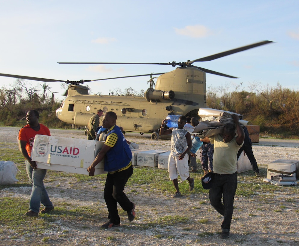 Service members from Joint Task Force Matthew and representatives from the United States Agency of International Development delivered relief supplies to areas afftcted by Hurricane Matthew to Jeremie, Haiti, Oct. 7, 2016. JTF Matthew, a U.S. Southern Command-directed response team deployed to support U.S. disaster relief operations in the Caribbean in response to Hurricane Matthew, delivered over 10,000 pounds of supplies on its first day of operations.