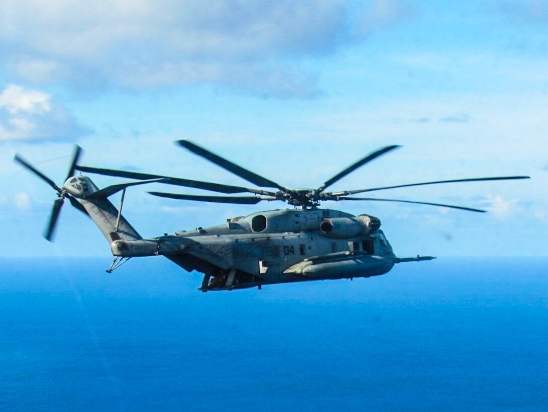 A section of CH-53E Super Stallion Helicopters flew to Grand Cayman Island in order to ensure rapid response to Hurricane Matthew if requested to do so from Soto Cano Air Base, Honduras, Oct. 4, 2016. The SPMAGTF-SC is part of a U.S Southern Command response team staged at Grand Cayman Island, ready to support U.S disaster relief operations in the Caribbean in response to Hurricane Matthew. SPMATF-SC deployed to Central America in June to serve as a rapid response force during the hurricane season. (U.S. Marine Corps photo by Capt. Tyler Hopkins//released)