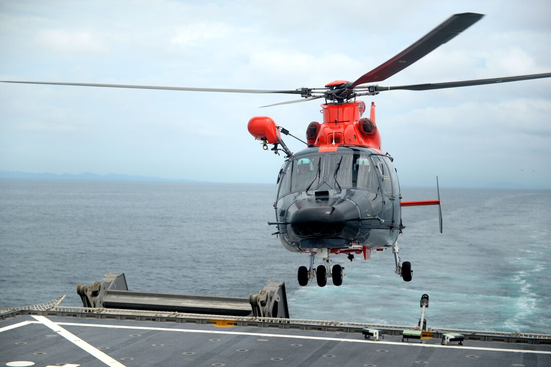 GULF OF PANAMA (Sept. 22, 2016) – A Chilean Toro Dauphine (Dolphin) HH-65 lands on board USNS Spearhead (T-EPF 1), embarking multinational force staff participating in UNITAS 2016. UNITAS is an annual multi-national exercise that focuses on strengthening our existing regional partnerships and encourages establishing new relationships through the exchange of maritime mission-focused knowledge and expertise throughout the exercise. (U.S. Navy Photo by Mass Communication Specialist 1st Class Jacob Sippel/RELEASED)