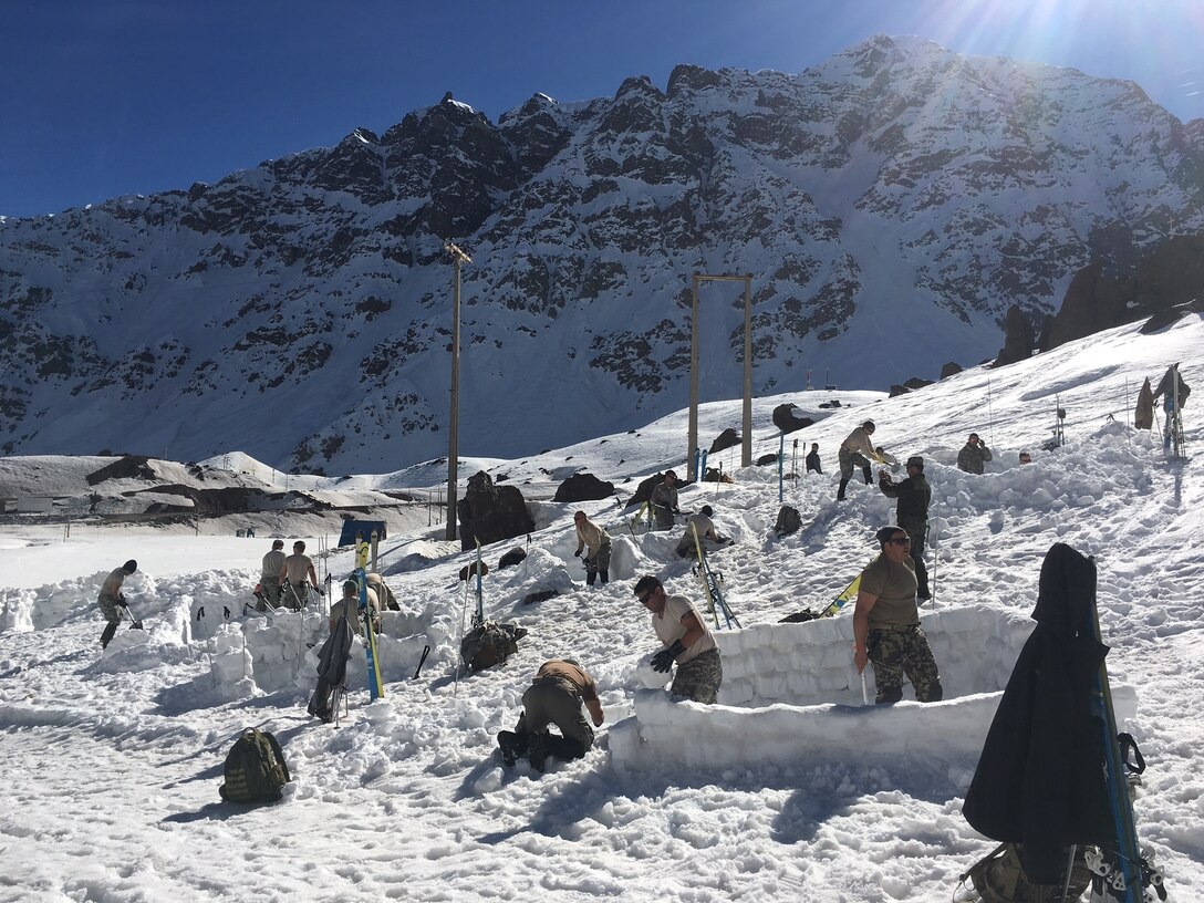 Texas Guardsmen work alongside the Chilean soldiers during the Chilean Mountain School course August 15-26, 2016 in Portillo, Chile. The 10-day course consisted of basic competencies on movement, maneuvering, and life-saving techniques in spring and winter mountain terrain. Through these military exchanges, soldiers are given the opportunity to experience new types of operations. (Courtesy Photo)