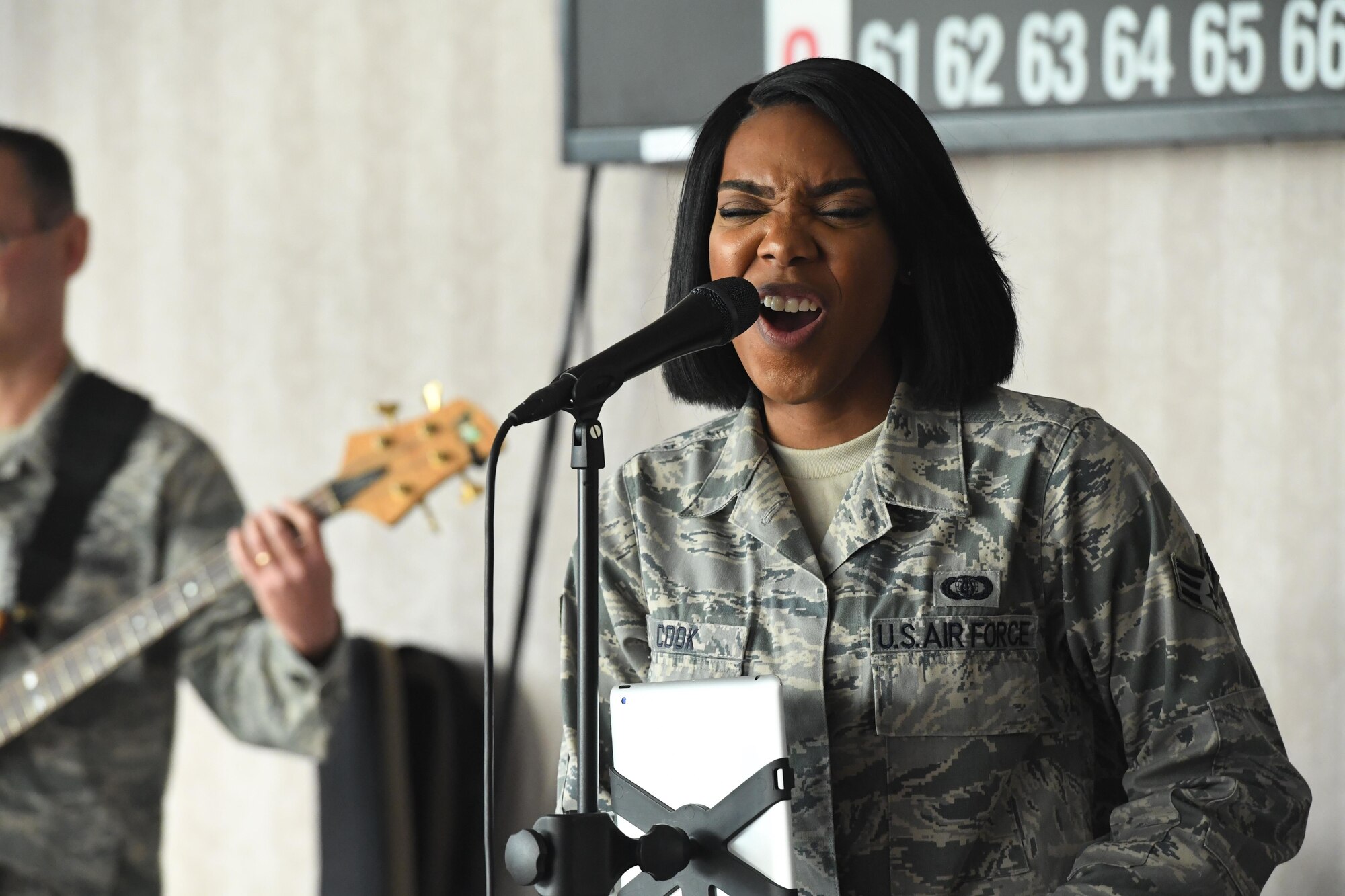 Senior Airman Ashley Cook, a vocalist with the U.S. Air Force Heritage of America Band’s Blue Aces, sings during a holiday concert at the Hampton Veteran’s Medical Center, Dec. 7, 2016. The event’s purpose was to inspire, honor and connect with veterans from the past and present. Since 1941, U.S. Air Force bands have inspired billions of listeners through its music, concerts and recordings. Today, they continue to positively impact the global community. (U.S. Air Force photo by Staff Sgt. Nick Wilson)
