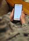 SCHRIEVER AIR FORCE BASE, Colo. -- An Airman dial 567-HELP to find a helping agency at Schriever Air Force Base, Colorado, Wednesday, Dec. 14, 2016. 567-HELP is a one-stop shop for those needing access to agencies such as the Schriever Law Enforcement Desk or Schriever's Airmen Against Drunk Driving. (U.S. Air Force Photo/Staff Sgt. Matthew Coleman-Foster)