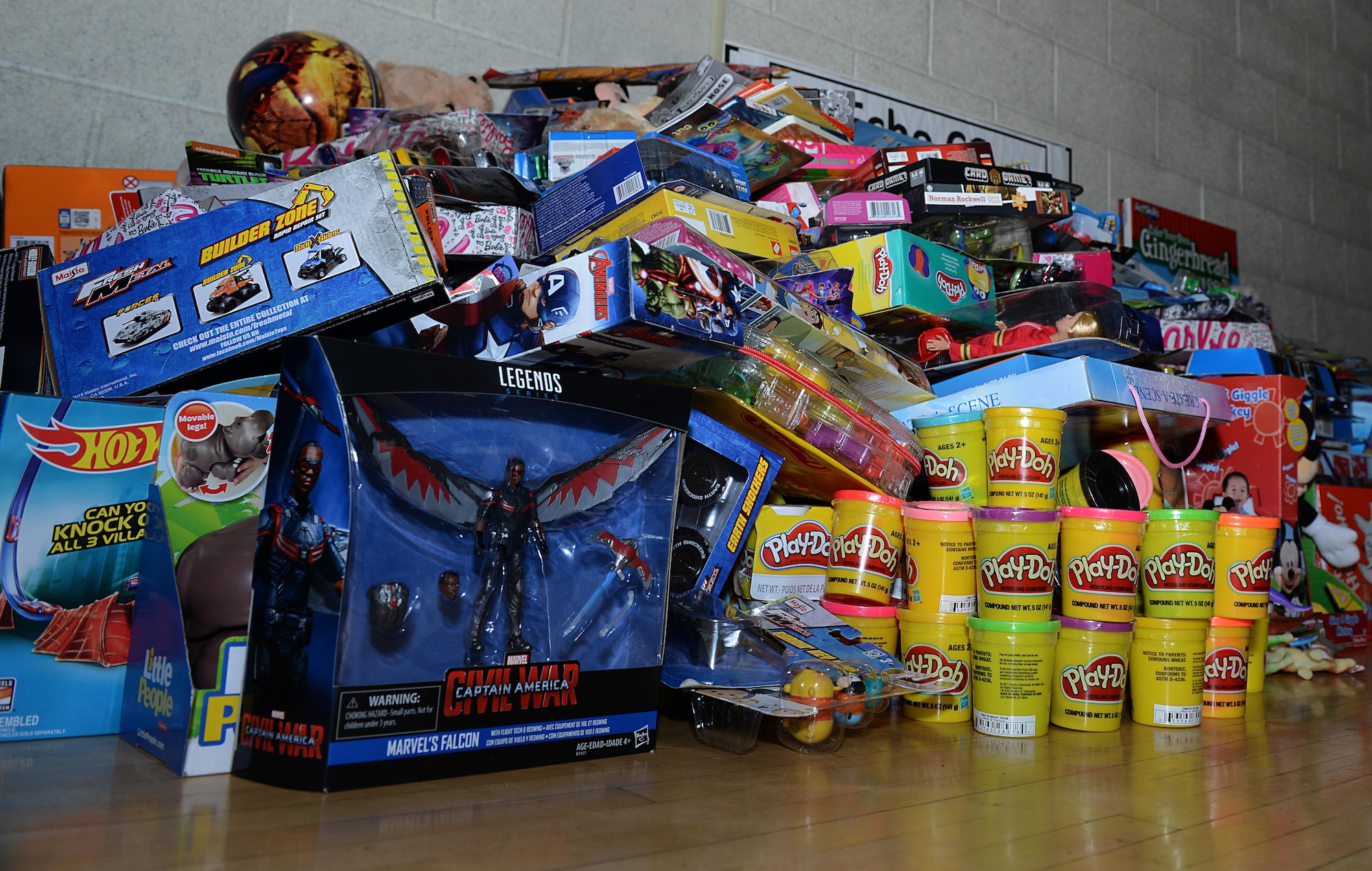 Units assigned to Joint Base Langley-Eustis, Va., donated more than 5,300 toys in support of the U.S. Marine Corps’ Toys for Tots program, at JBLE, Dec. 8, 2016. Trophies were given to the unit that donated the most toys to the program. (U.S. Air Force photo by Staff Sgt. Teresa J. Cleveland)