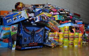 Units assigned to Joint Base Langley-Eustis, Va., donated more than 5,300 toys in support of the U.S. Marine Corps’ Toys for Tots program, at JBLE, Dec. 8, 2016. Trophies were given to the unit that donated the most toys to the program. (U.S. Air Force photo by Staff Sgt. Teresa J. Cleveland)