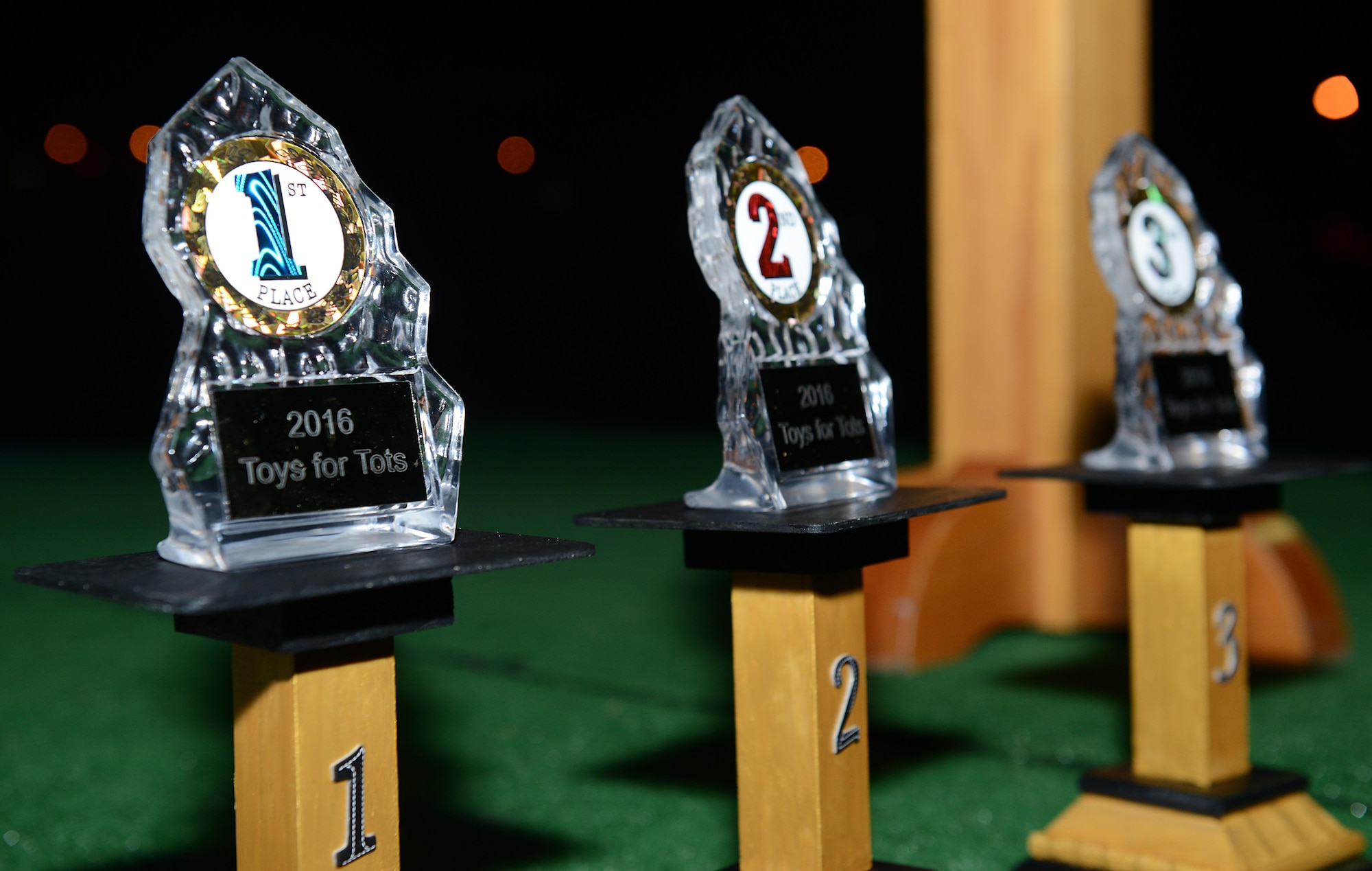 Trophies were awarded to units that donated the most toys during the opening ceremonies of the annual U.S. Marine Corp’s Toys for Tots holiday run at Joint Base Langley-Eustis, Va., Dec. 9, 2016. The first place trophy went to Soldiers assigned to the 1st Battalion, 222nd Aviation Regiment, who donated more than 3,000 toys. (U.S. Air Force photo by Staff Sgt. Teresa J. Cleveland)
