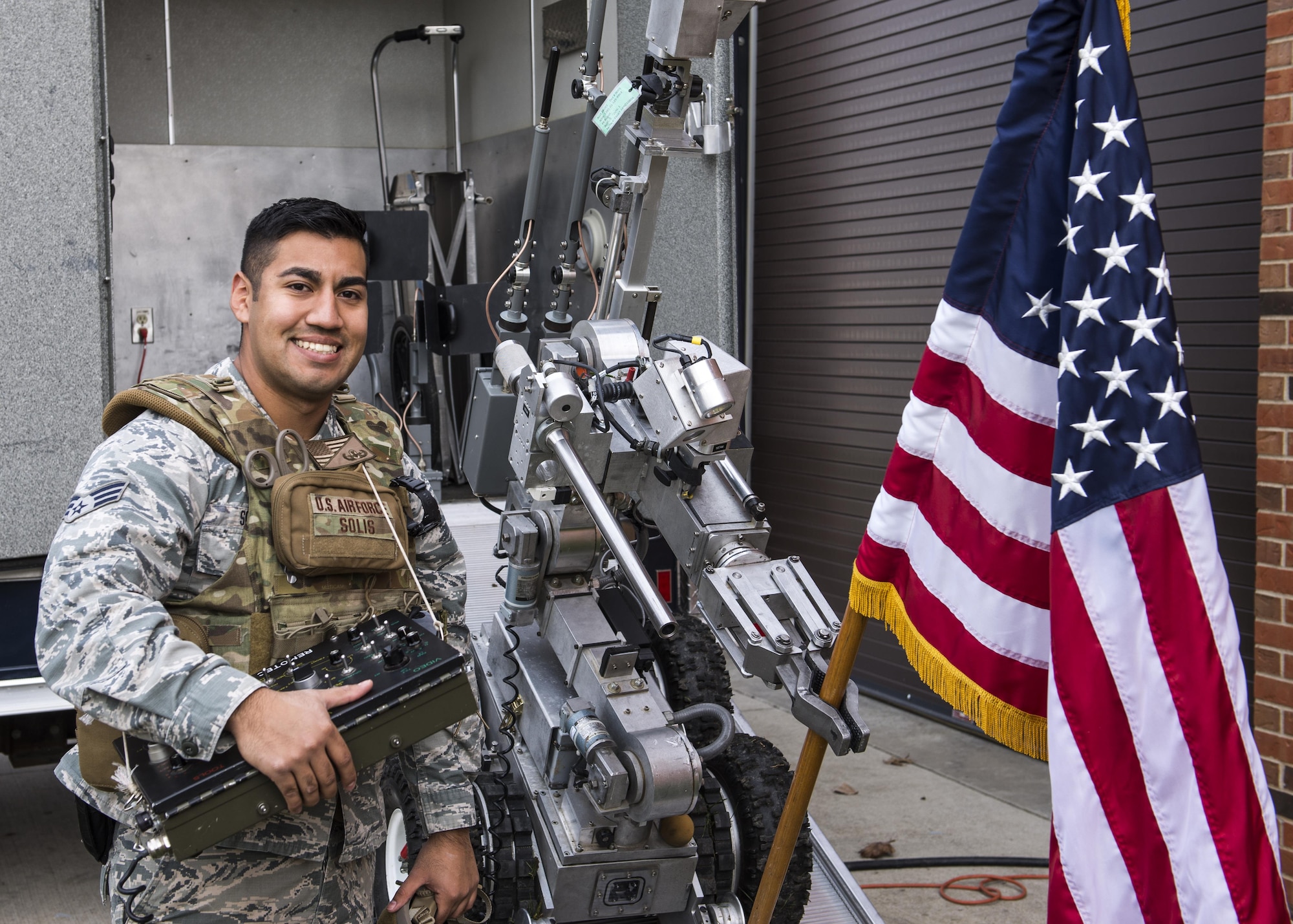 Senior Airman Emilio Solis, 375th Civil Engineer Squadron, was the key member in the identification of an innovative modification to the 375th Explosive Ordinance Disposal Flight's response vehicle. He identified an efficient way of offloading the EOD robot with a new ramp. (U.S. Air Force photo by Airman 1st Class Daniel Garcia)