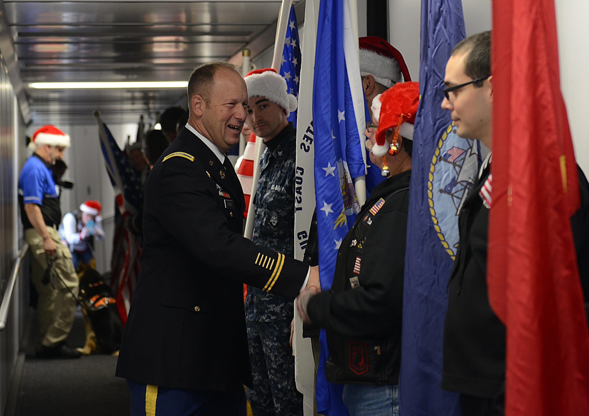 U.S. Army Col. Ralph Clayton III, 733rd Mission Support Group commander, thanks U.S. service members and the Virginia Patriot Guard for their participation in the Snowball Express at Norfolk International Airport, Va., Dec. 11, 2016. Since 2006, American Airlines and the Snowball Express have sent families to various locations during the holiday season to meet and spend time with other Gold Star families from around the world. (U.S. Air Force photo by Staff Sgt. Teresa J. Cleveland)