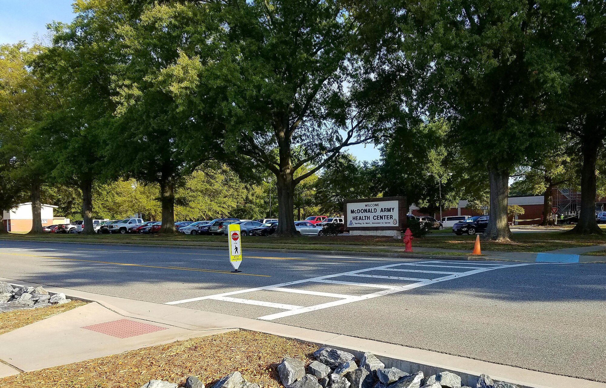 Crossing signs alert drivers to slow down and stop for pedestrians using the crosswalk, which is located on Jefferson Avenue across from Fort Eustis’ McDonald Army Health Center, at Joint Base Langley-Eustis, Va., Nov. 14, 2016. According to the 733rd Civil Engineer Division, this location is one of the most heavily traveled areas on Fort Eustis with documented pedestrian safety issues. (U. S. Air Force photo by Beverly Joyner)