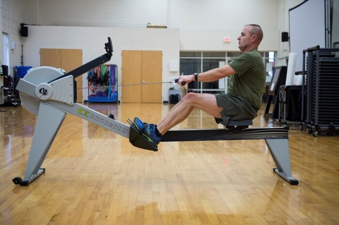 Male Marine demonstrating proper rowing technique