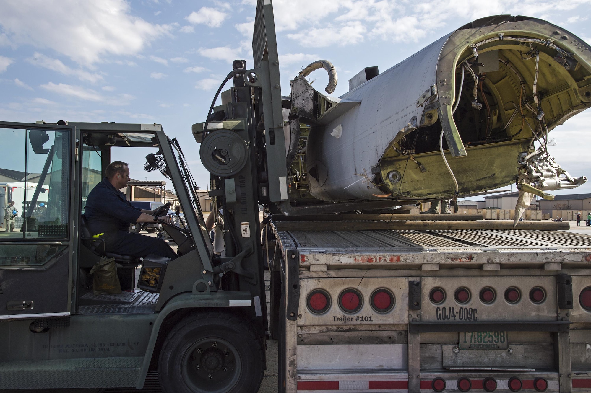 Tech. Sgt. Richard Paulk 23d Equipment Maintenance Squadron repair and reclamation craftsman uses a forklift to lower the fuselage of an A-10A Thunderbolt II onto a flatbed truck, Dec. 1, 2016, at Moody Air Force Base, Ga. This was Moody’s last A-10A which was manufactured in 1980 in Baltimore, Md., and was officially completed on Nov. 3, 1981. (U.S. Air Force photo by Staff Sgt. Eric Summers)