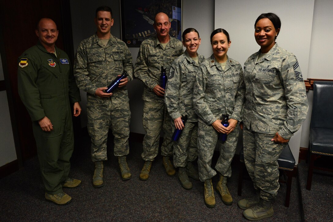 U.S. Airmen from the 20th Dental Squadron dental lab are recognized as the Shaw “Weasels of the Week” by 20th Fighter Wing leadership at Shaw Air Force Base, S.C., Dec. 14, 2016. The Airmen were chosen for their efforts in performing approximately 3,000 procedures, supporting 9,200 appointments and increasing production while only 33 percent staffed for three months. (U.S. Air Force photo by Airman 1st Class Kelsey Tucker)